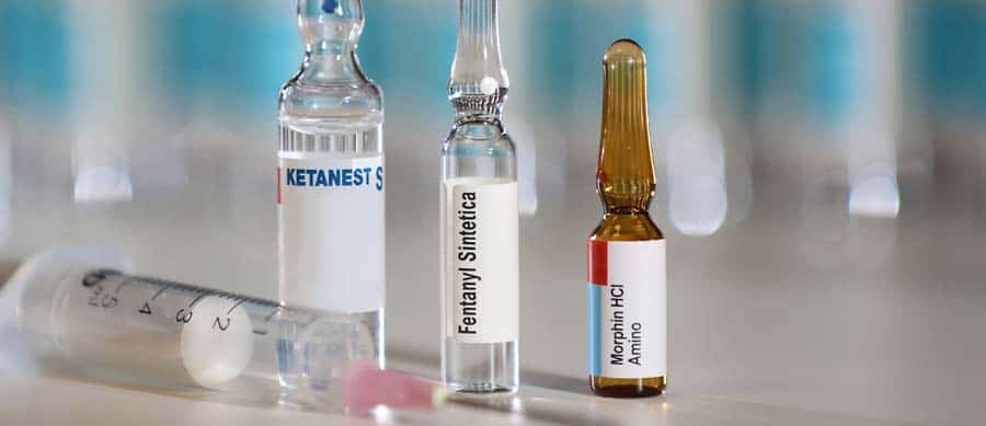 bottle and syringe of morphine