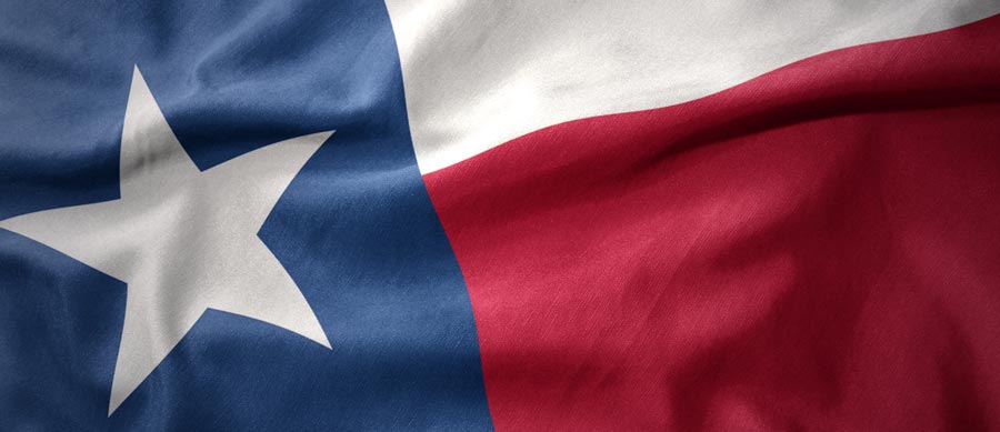 Texas flag representing the growing overdose crisis and substance abuse issues across the state.