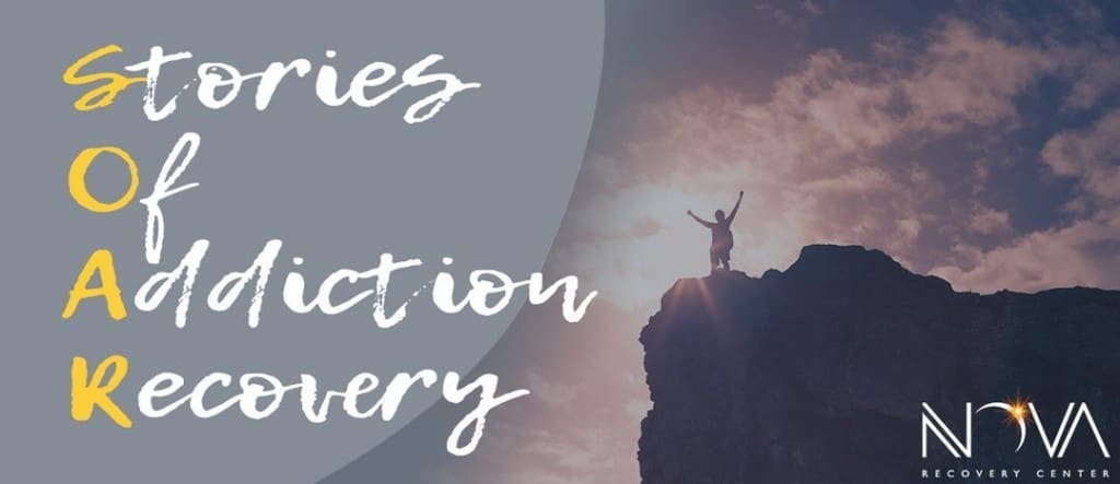 Silhouette of a person standing triumphantly atop a cliff at sunset, symbolizing breaking free from the downward spiral of addiction toward sobriety and recovery.