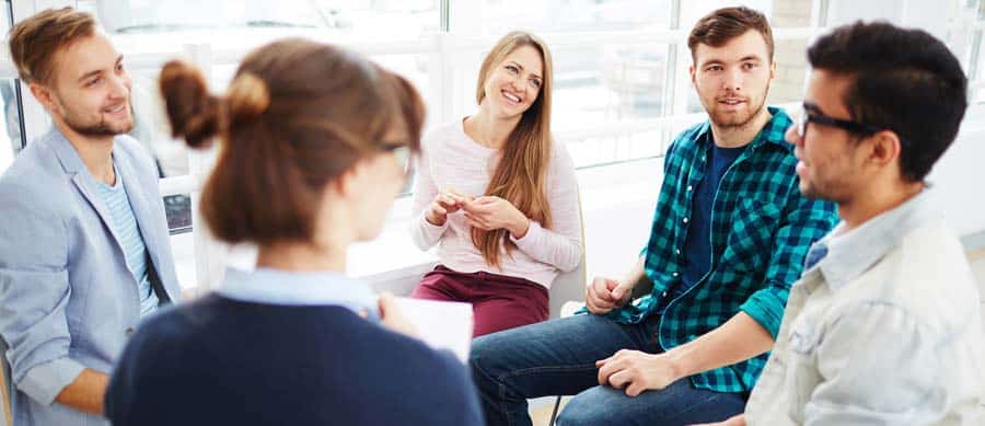 Group therapy session supporting individuals in addiction recovery