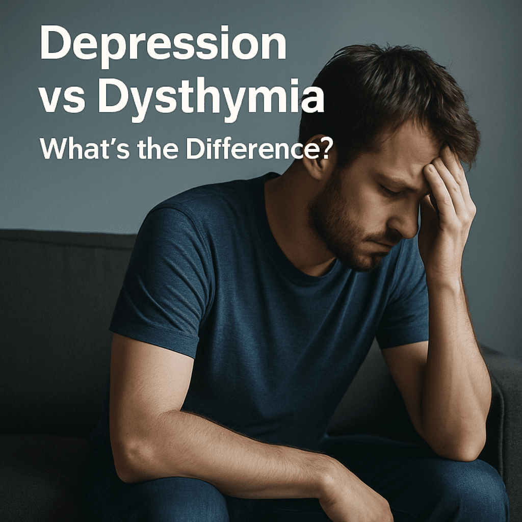A man sitting on a couch with his head in his hands, visually representing the emotional struggle of depression vs dysthymia.