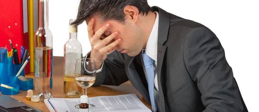 man abusing drugs in the office